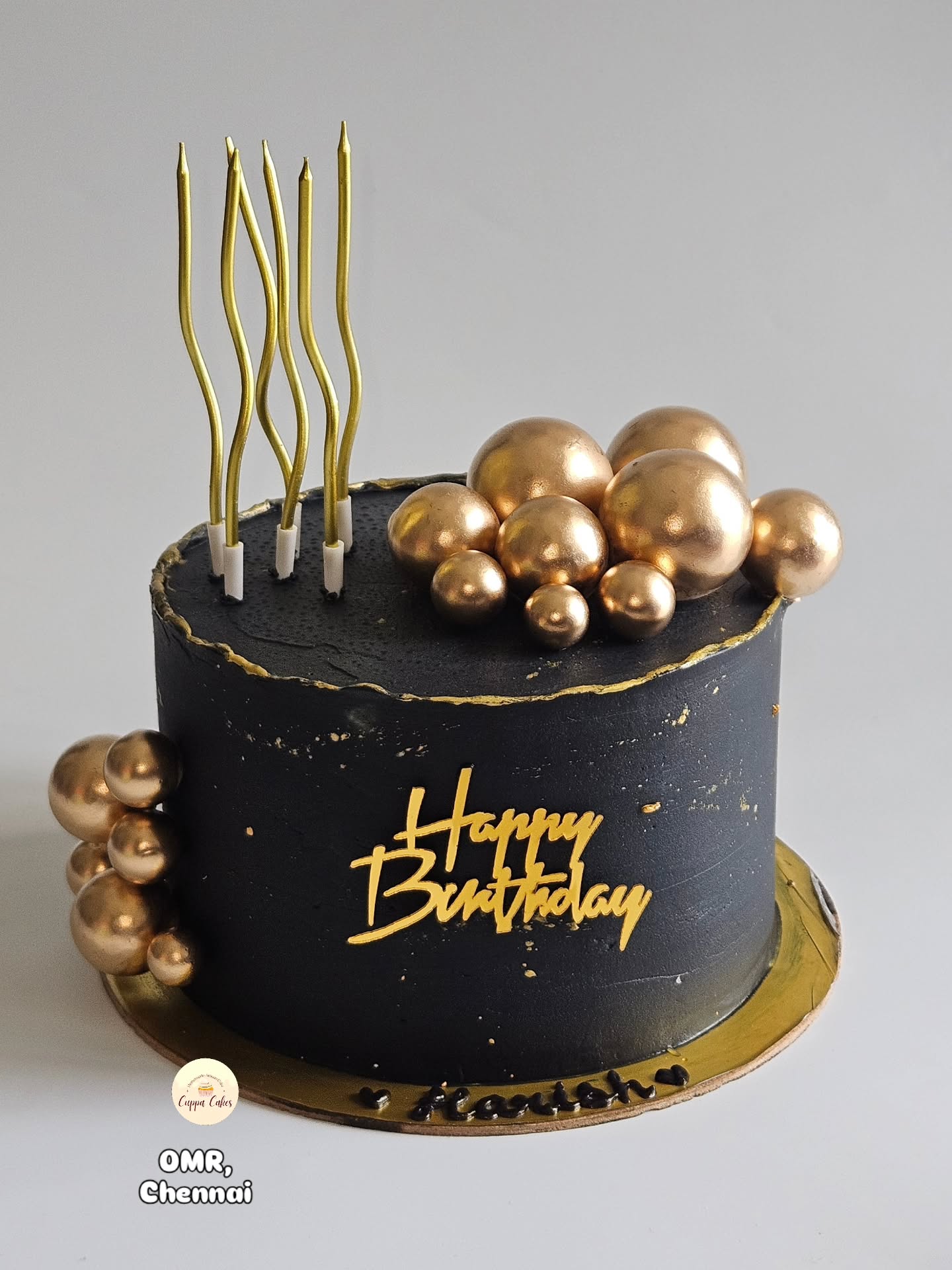Black and gold buttercream birthday cake by Cuppa Cakes